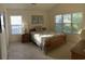 Serene bedroom with lots of natural light, a comfortable bed, and matching nightstands at 131 Goodale Dr., Longs, SC 29568