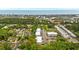 Gorgeous aerial view of a coastal community featuring lush greenery and a pristine beach backdrop at 144 Puffin Dr. # 2A, Pawleys Island, SC 29585