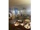 Hotel Restaurant with tables and chairs, flat screen TV, and view of the kitchen at 1501 S Ocean Blvd. # 1112, Myrtle Beach, SC 29577