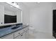 A modern bathroom featuring a marble sink, a toilet, and a black tiled shower at 1590 Landing Rd., Myrtle Beach, SC 29577