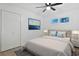 Bright bedroom featuring a bed, ceiling fan, closet, and stylish decor at 1590 Landing Rd., Myrtle Beach, SC 29577