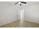 Neutrally painted bedroom with a ceiling fan and wood-look flooring at 1590 Landing Rd., Myrtle Beach, SC 29577