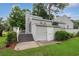 Home's back exterior featuring storage shed and tiered deck at 1590 Landing Rd., Myrtle Beach, SC 29577