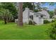 Charming home with lush green yard, mature trees, and deck at 1590 Landing Rd., Myrtle Beach, SC 29577