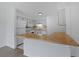Galley-style kitchen with white cabinets, wood countertops, and appliances at 1590 Landing Rd., Myrtle Beach, SC 29577