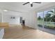 Living area showcasing open layout, slider to deck, fireplace and breakfast bar at 1590 Landing Rd., Myrtle Beach, SC 29577