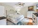 Well-lit bedroom with a comfortable bed, coordinating décor, and ample natural light from the windows at 17 South Oak Dr., Surfside Beach, SC 29575