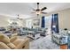 Spacious living room with hardwood floors, comfortable seating, and a dining area at 17 South Oak Dr., Surfside Beach, SC 29575