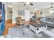 Inviting living room featuring hardwood floors, comfortable sofas, and access to kitchen at 17 South Oak Dr., Surfside Beach, SC 29575