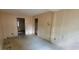 Bedroom featuring stained flooring, plain walls and access to closet at 1744 John St., Conway, SC 29527