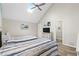 Vaulted ceiling bedroom with a skylight and ceiling fan at 1891 Colony Dr. # 15 J, Surfside Beach, SC 29575
