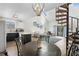 Stylish living space with a spiral staircase, modern kitchen, and natural light, creating a unique and inviting home at 1891 Colony Dr. # 15 J, Surfside Beach, SC 29575