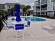 Community pool features a large patio for relaxing and enjoying the weather at 1891 Colony Dr. # 15 J, Surfside Beach, SC 29575
