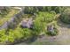 Aerial view of a house with outbuilding bordered by a country road and agricultural fields at 1895 Bucksville Dr., Conway, SC 29527