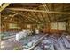 Unfinished basement with exposed wooden beams, brick walls, and potential for customization at 1895 Bucksville Dr., Conway, SC 29527