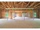 Spacious garage with exposed wood framework offering endless possibilities for customization and expansion at 1895 Bucksville Dr., Conway, SC 29527