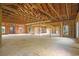 Expansive unfinished garage showcasing potential with abundant natural light and exposed wood framework at 1895 Bucksville Dr., Conway, SC 29527