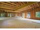 A spacious unfinished garage showing exposed wood beams, perfect for creating a customized space at 1895 Bucksville Dr., Conway, SC 29527