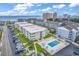 Elevated view of residences with community pool and ocean views beyond at 191 Maison Dr. # B-123, Myrtle Beach, SC 29572