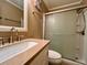 Bathroom with a single sink vanity and enclosed shower with a sliding glass door at 191 Maison Dr. # B-123, Myrtle Beach, SC 29572