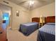 Well-lit bedroom with two twin beds and a closet featuring ample storage at 191 Maison Dr. # B-123, Myrtle Beach, SC 29572