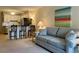 Bright and inviting living area flows into the kitchen with bar seating, creating an open concept space at 191 Maison Dr. # B-123, Myrtle Beach, SC 29572