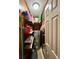Compact storage area with wood paneling, shelves, and a hot water tank at 191 Maison Dr. # B-123, Myrtle Beach, SC 29572