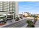 Exterior shot of the condo community showing well-maintained landscaping and convenient parking at 200 53Rd Ave. N # 209, North Myrtle Beach, SC 29582
