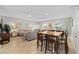 Spacious living room with tile floors, ceiling fans, comfortable seating, and natural light at 200 53Rd Ave. N # 209, North Myrtle Beach, SC 29582