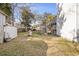 Large backyard with a shed and stairs leading to an upper deck, ideal for outdoor enjoyment at 2005 Havens Dr., North Myrtle Beach, SC 29582