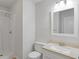 Bathroom featuring a walk-in shower, a toilet, and a vanity with a framed mirror and vanity lights at 2005 Havens Dr., North Myrtle Beach, SC 29582