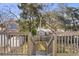 Deck with wooden railing overlooking the yard and a small storage shed at 2005 Havens Dr., North Myrtle Beach, SC 29582