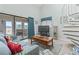 Bright living room with a sliding glass door that opens to the balcony at 207 Double Eagle Dr. # F-3, Myrtle Beach, SC 29575
