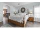 Comfortable bedroom featuring a wooden bed frame, stylish lamps, and plenty of space at 2191 Deerfield Ave., Surfside Beach, SC 29575