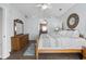 Comfortable primary bedroom with ceiling fan, connected bath and plenty of natural light at 2191 Deerfield Ave., Surfside Beach, SC 29575