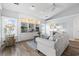 Comfortable living room with wood floors, built-in shelving, and ample natural light at 2191 Deerfield Ave., Surfside Beach, SC 29575