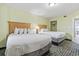 Cozy bedroom with two inviting beds, a lamp, and a closet for ample storage at 2201 South Ocean Blvd. # 1808, Myrtle Beach, SC 29577