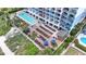 Beautiful pool deck with lounging chairs, umbrellas, and a serene pool view at 2201 South Ocean Blvd. # 1808, Myrtle Beach, SC 29577