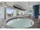 Inviting covered hot tub and pool deck area with seating for relaxation and enjoyment at 2201 South Ocean Blvd. # 1808, Myrtle Beach, SC 29577