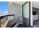 Cozy balcony with a chair and ocean view, perfect for relaxing and enjoying the sea breeze at 2311 South Ocean Blvd. # 559, Myrtle Beach, SC 29577