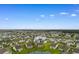 Aerial view of a charming home and neighborhood with a scenic pond at 2317 Myerlee Dr., Myrtle Beach, SC 29588