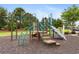 Community playground with climbing structures, slides, and wood chip ground cover at 2317 Myerlee Dr., Myrtle Beach, SC 29588