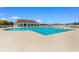 Large fenced in pool with lots of lounge chairs and clubhouse at 2317 Myerlee Dr., Myrtle Beach, SC 29588