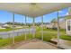 This screened porch has lovely water views and a ceiling fan for added comfort at 2317 Myerlee Dr., Myrtle Beach, SC 29588