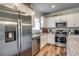 Well-equipped kitchen with stainless steel appliances, granite counters, and ample cabinet space at 240 Wagner Cir., Conway, SC 29526