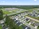 Aerial view of neighborhood highlighting the surrounding area's lush trees and green spaces at 2405 Capri Court, Conway, SC 29527