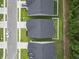 Aerial view shows houses, lawns, and street layout in new residential development at 2405 Capri Court, Conway, SC 29527