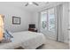 Cozy bedroom with carpet floors, ceiling fan, and natural light from the windows at 2405 Capri Court, Conway, SC 29527