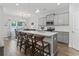 Modern kitchen with a spacious island, pendant lighting, and adjacent dining area at 2405 Capri Court, Conway, SC 29527