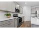 Beautiful kitchen with stainless appliances, stylish gray cabinetry and bright countertops at 2405 Capri Court, Conway, SC 29527